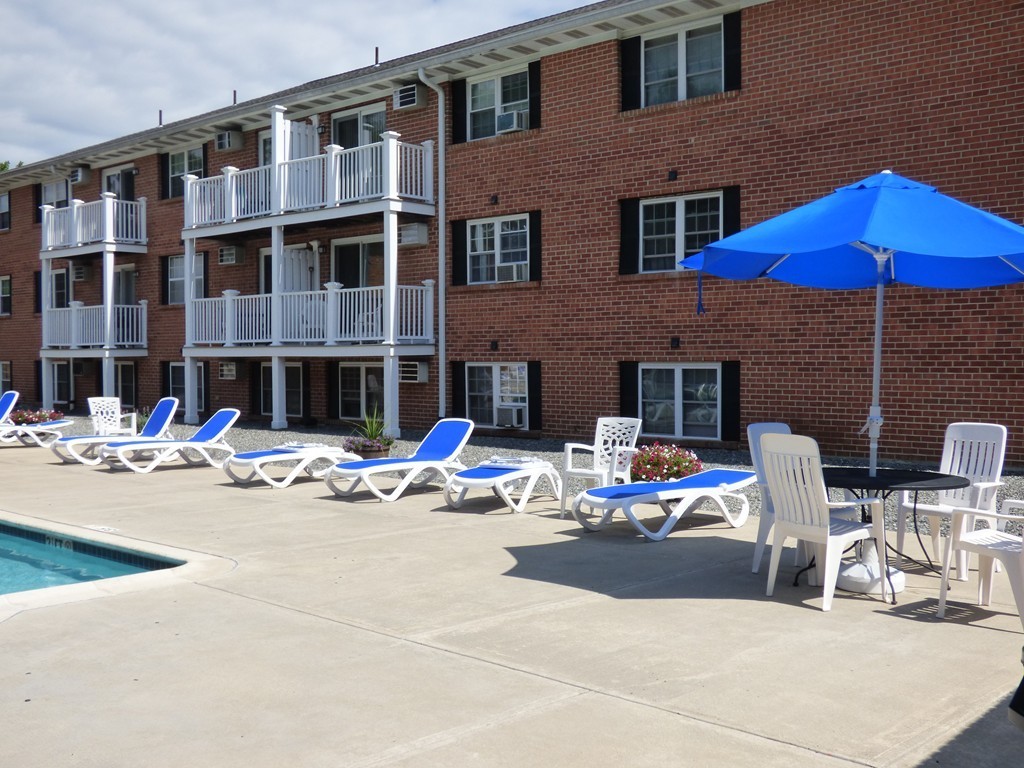 2 Leonard Road, Unit 2 Boxborough, MA 01719 - Photo 3 of 17 a view of pool with outdoor seating