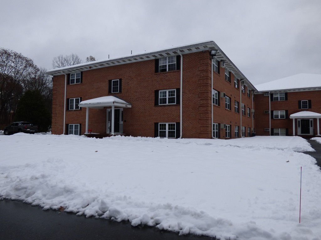 2 Leonard Road, Unit 2 Boxborough, MA 01719 - Photo 5 of 17 a front view of a house with a yard