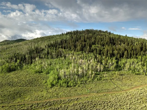 a view of a lake with mountains in the background