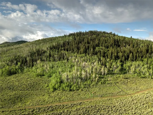 a view of a lake with mountains in the background