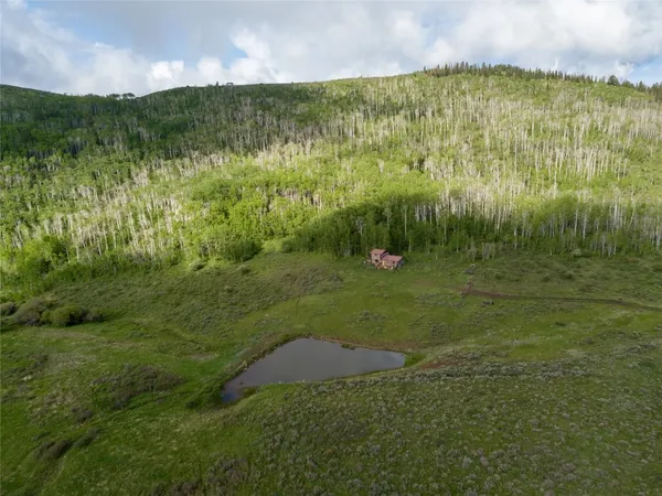 an aerial view of city and sign board