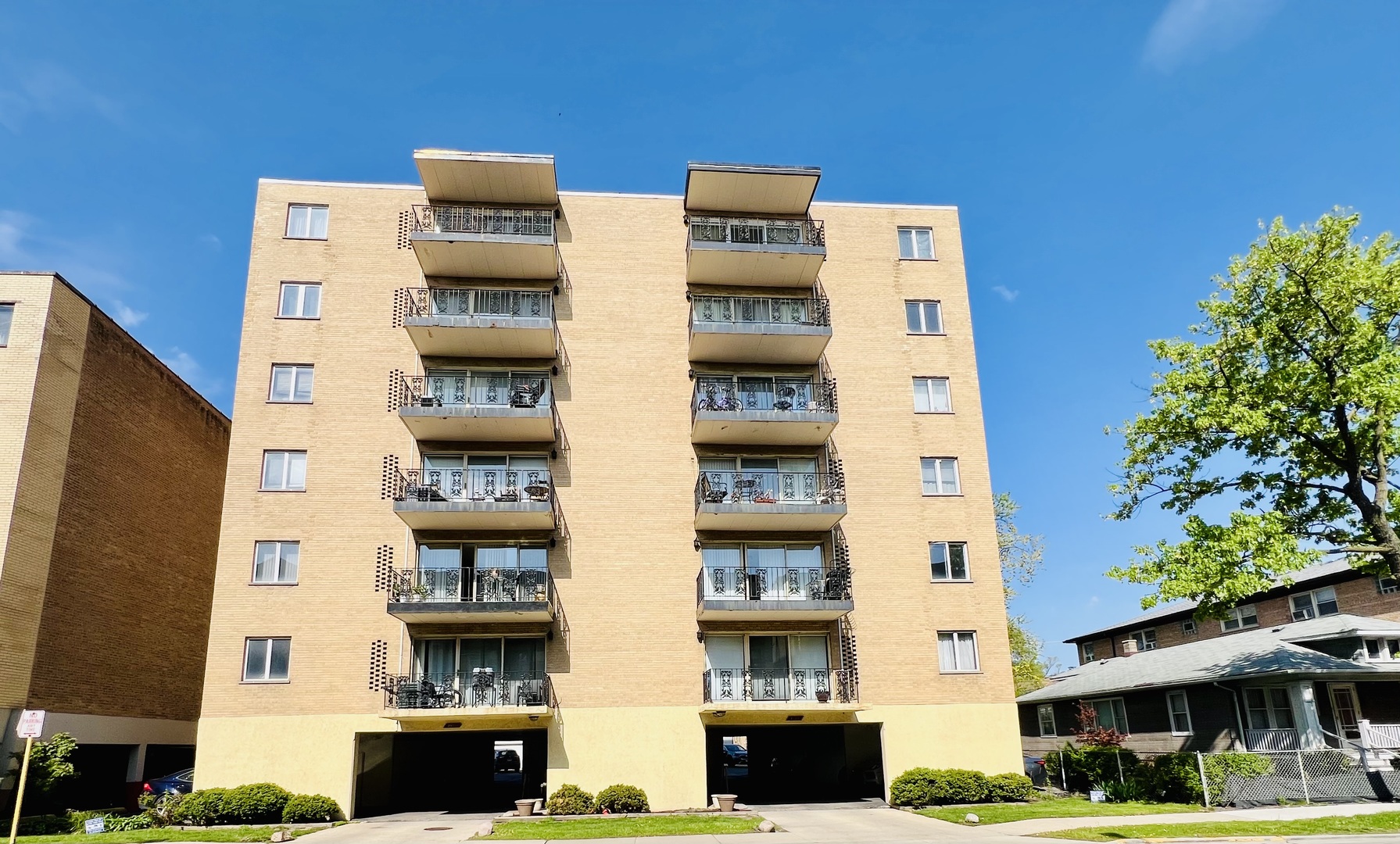 a front view of a building with a street
