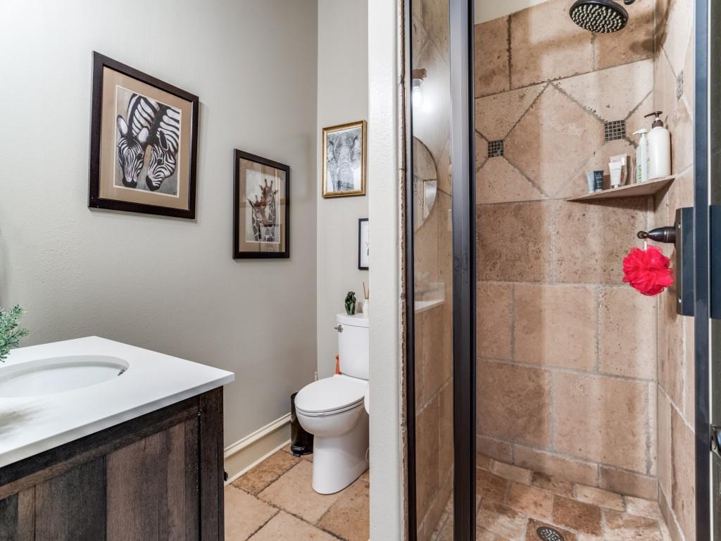 1912 Surrey Lane McKinney, TX 75072 - Photo 26 of 38 a bathroom with a sink toilet and shower