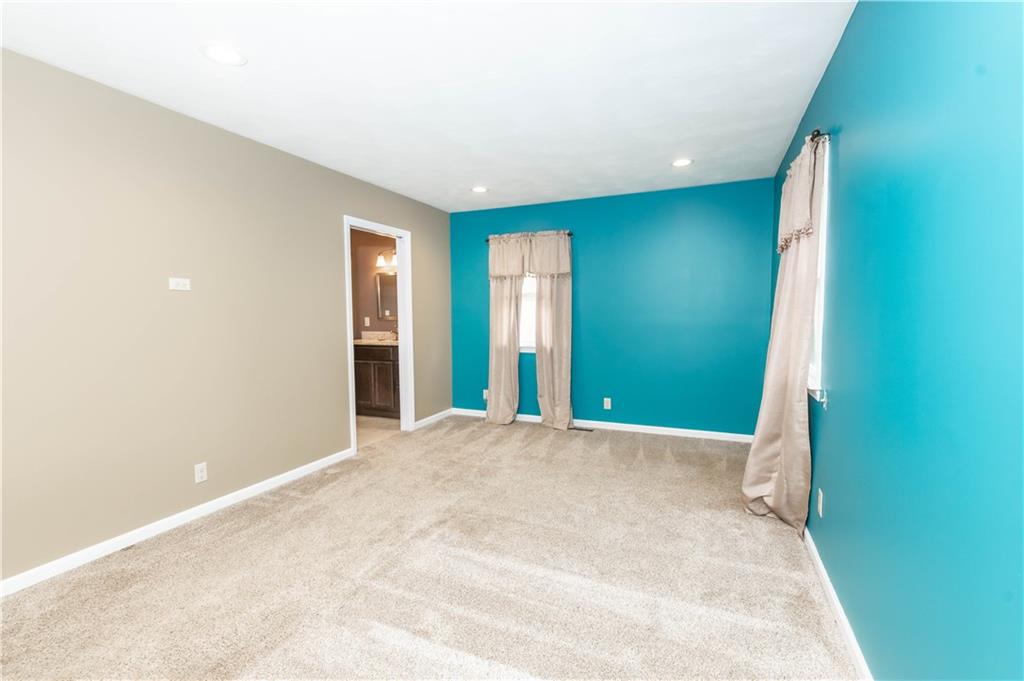 153 McMillen Road Home, PA 15747 - Photo 11 of 25 an empty room with windows and closet