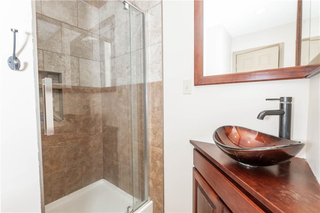 153 McMillen Road Home, PA 15747 - Photo 13 of 25 a bathroom with a sink and a mirror