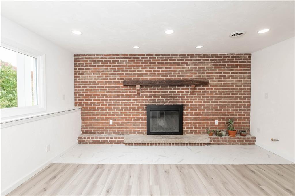 153 McMillen Road Home, PA 15747 - Photo 15 of 25 a living room with a fireplace