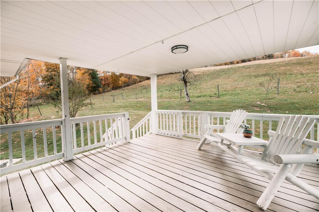153 McMillen Road Home, PA 15747 - Photo 20 of 25 a balcony with wooden floor