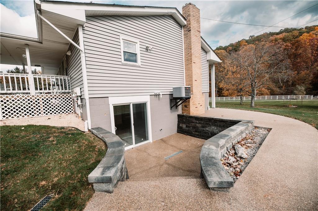 153 McMillen Road Home, PA 15747 - Photo 23 of 25 a view of a porch with furniture and garden