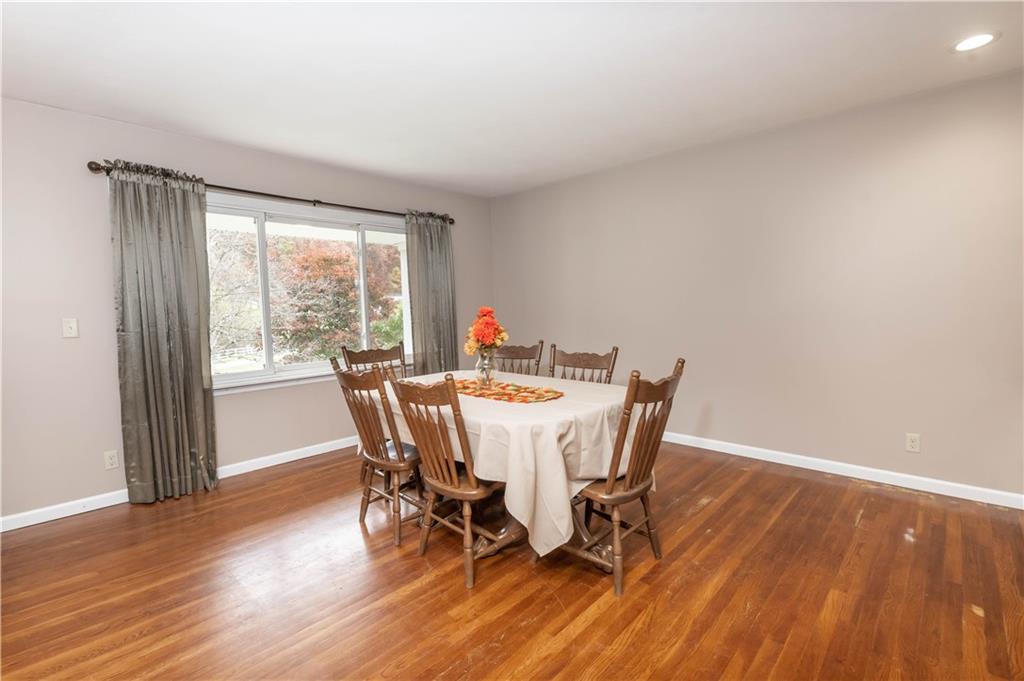 153 McMillen Road Home, PA 15747 - Photo 8 of 25 a view of a dining room with furniture window and wooden floor