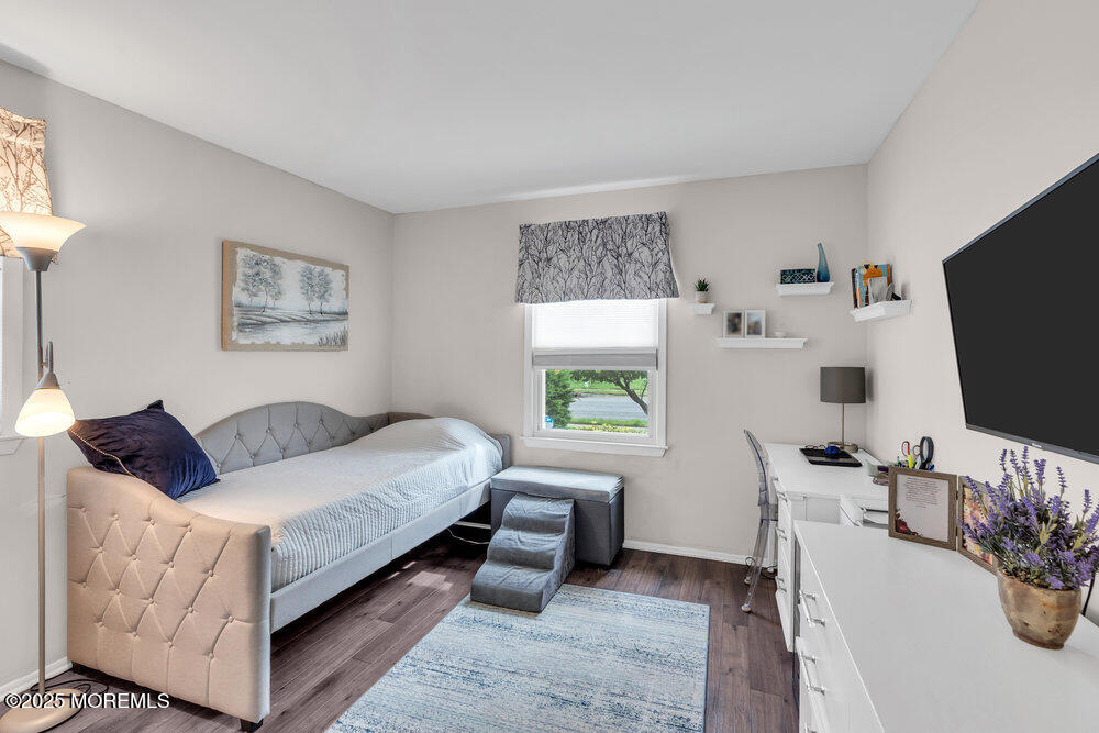 16 Thames Place Brick, NJ 08723 - Photo 16 of 28 a living room with furniture and a flat screen tv