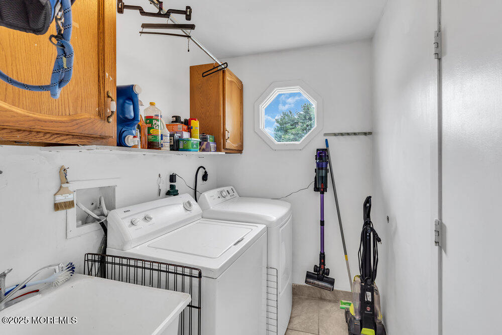 16 Thames Place Brick, NJ 08723 - Photo 24 of 28 a bathroom with a sink and a mirror
