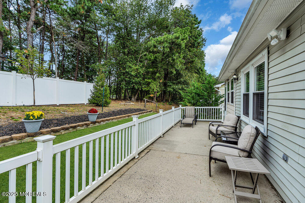 16 Thames Place Brick, NJ 08723 - Photo 25 of 28 a view of a chairs and tables in the balcony