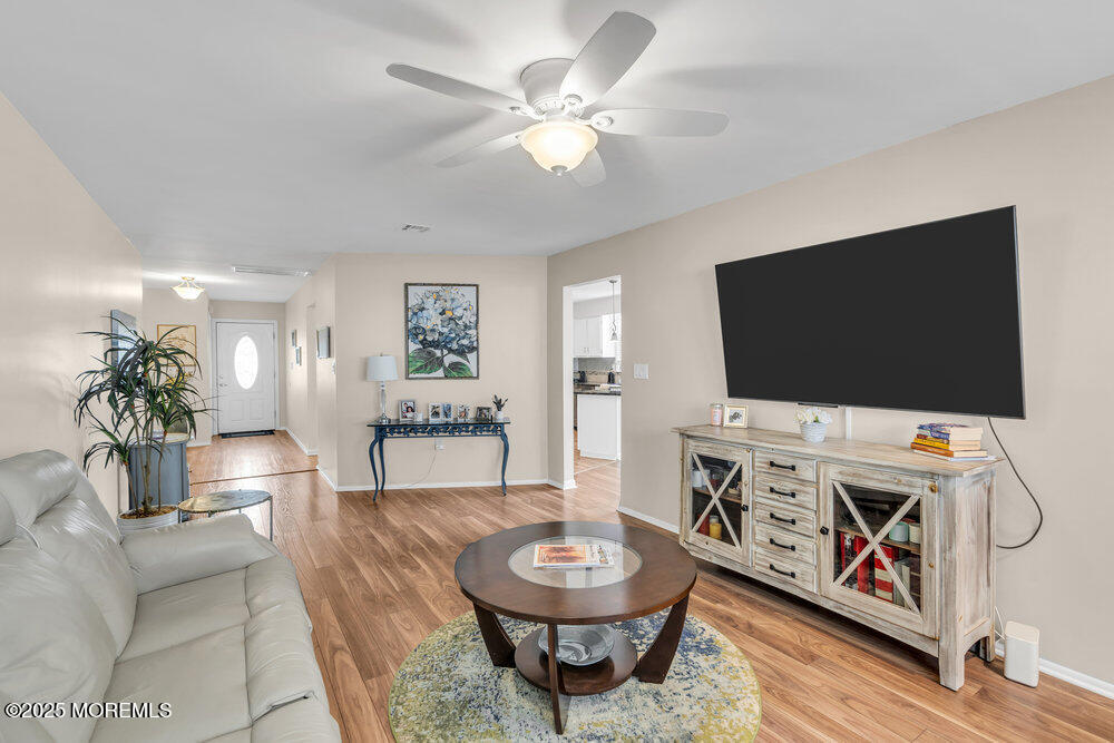 16 Thames Place Brick, NJ 08723 - Photo 5 of 28 a living room with furniture and a flat screen tv