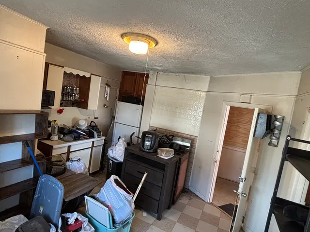 a room with furniture and a flat screen tv