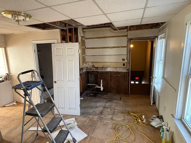 a bathroom with a tub and a shower
