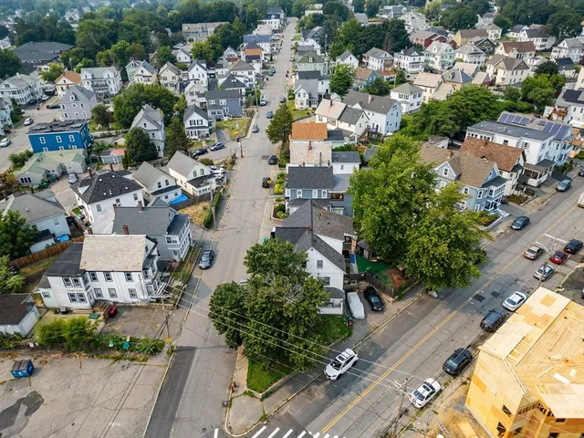 an aerial view of a city with lots of residential buildings