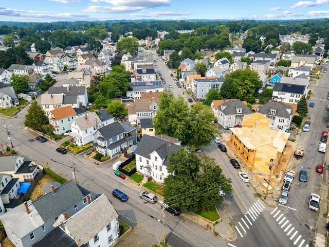 an aerial view of a city with lots of residential buildings