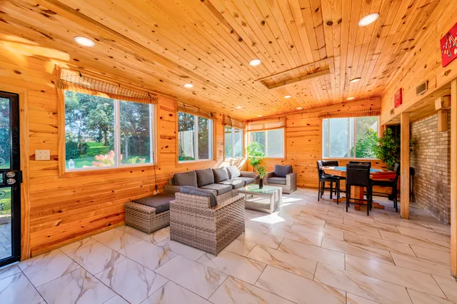 a outdoor space with patio furniture and a potted plant