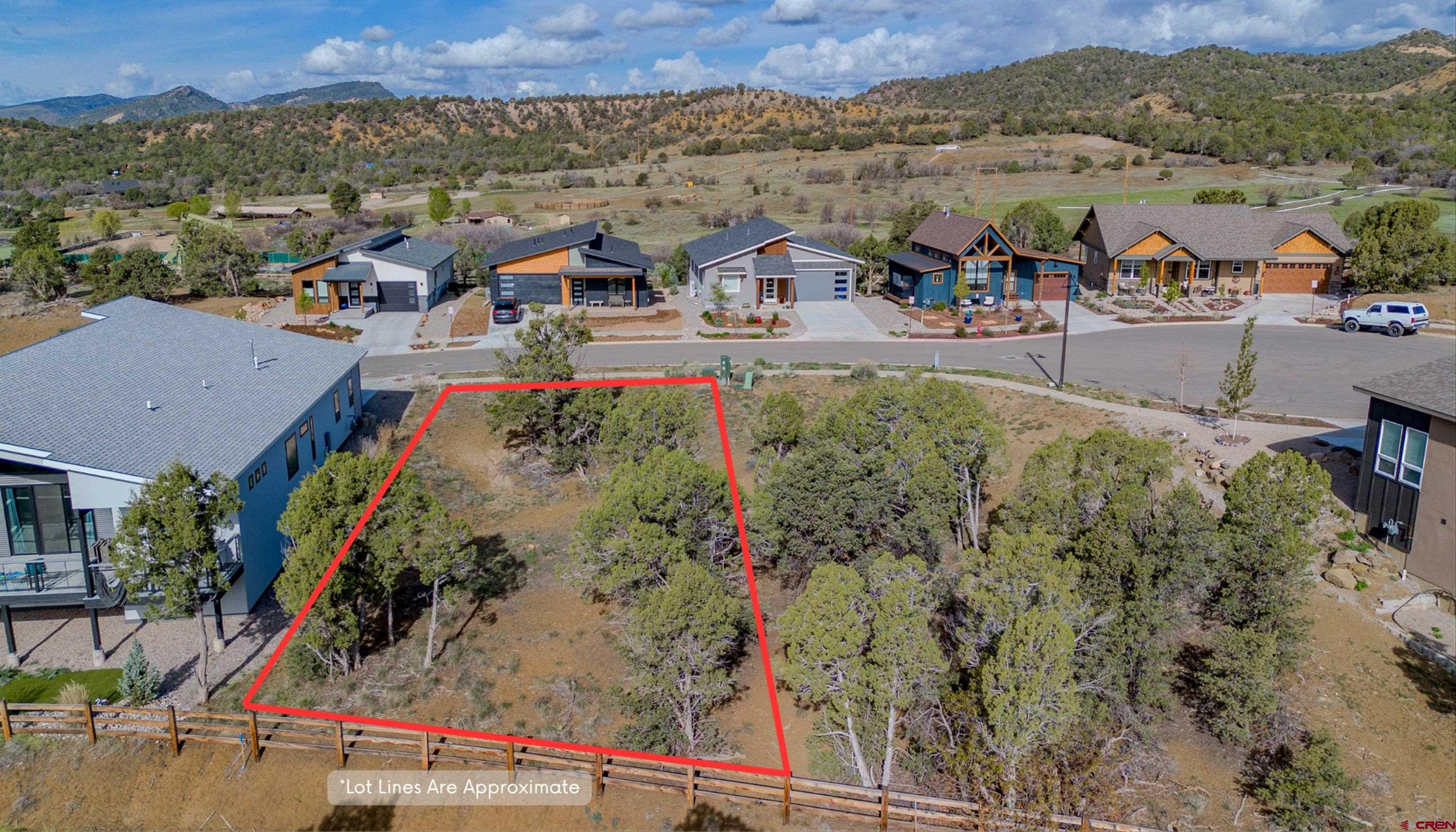 38 Yarrow Court Durango, CO 81301 - Photo 3 of 7 an aerial view of a house with a lake view