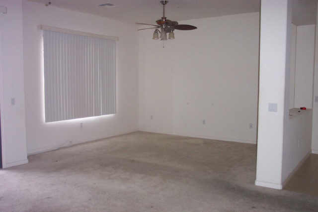 4488 East Thomas Road, Unit 1034 Phoenix, AZ 85018 - Photo 4 of 6 an empty room with a window