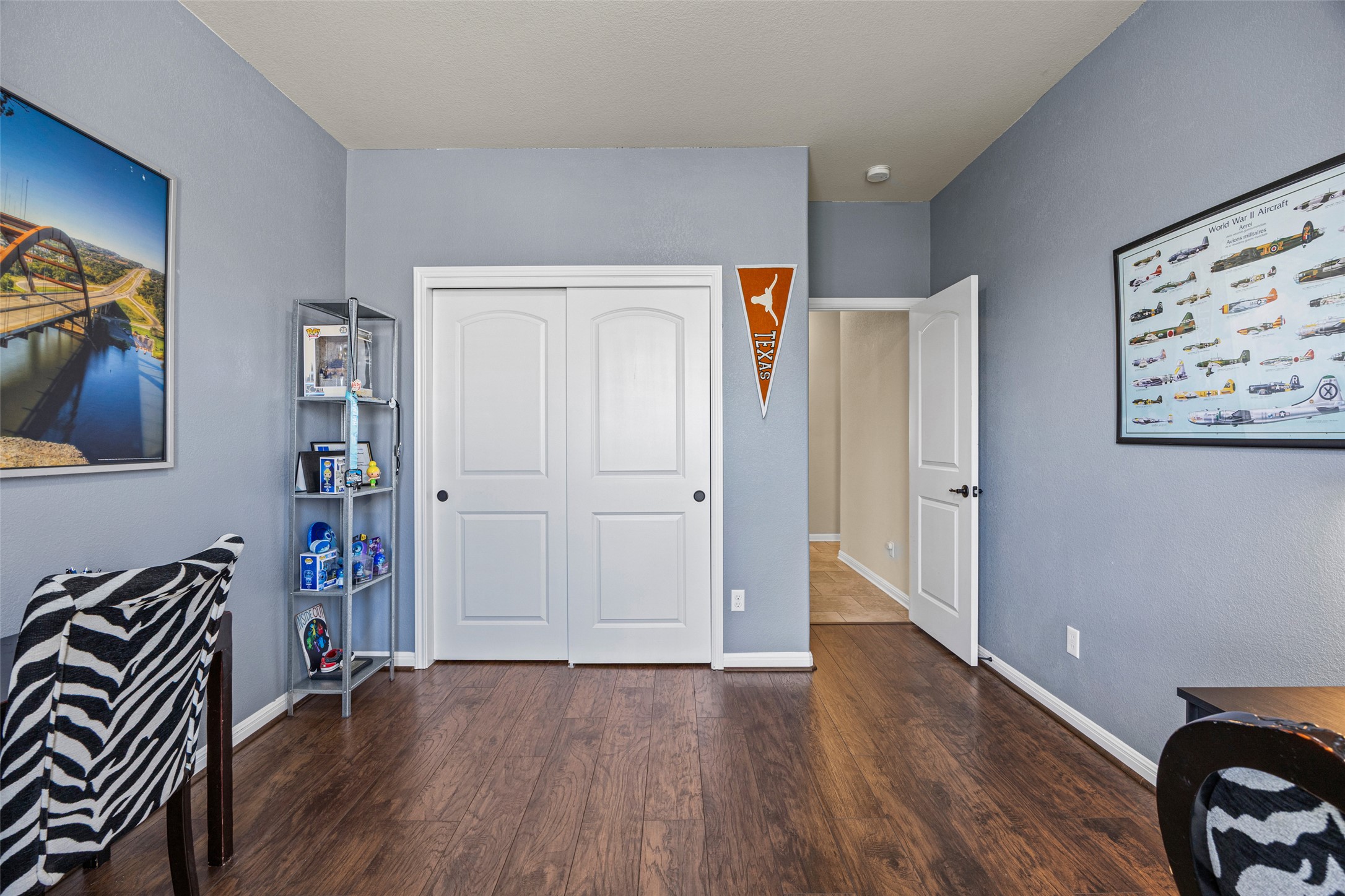 3451 Mayfield Ranch Boulevard, Unit 201 Round Rock, TX 78681 - Photo 21 of 29 a view of empty room with wooden floor