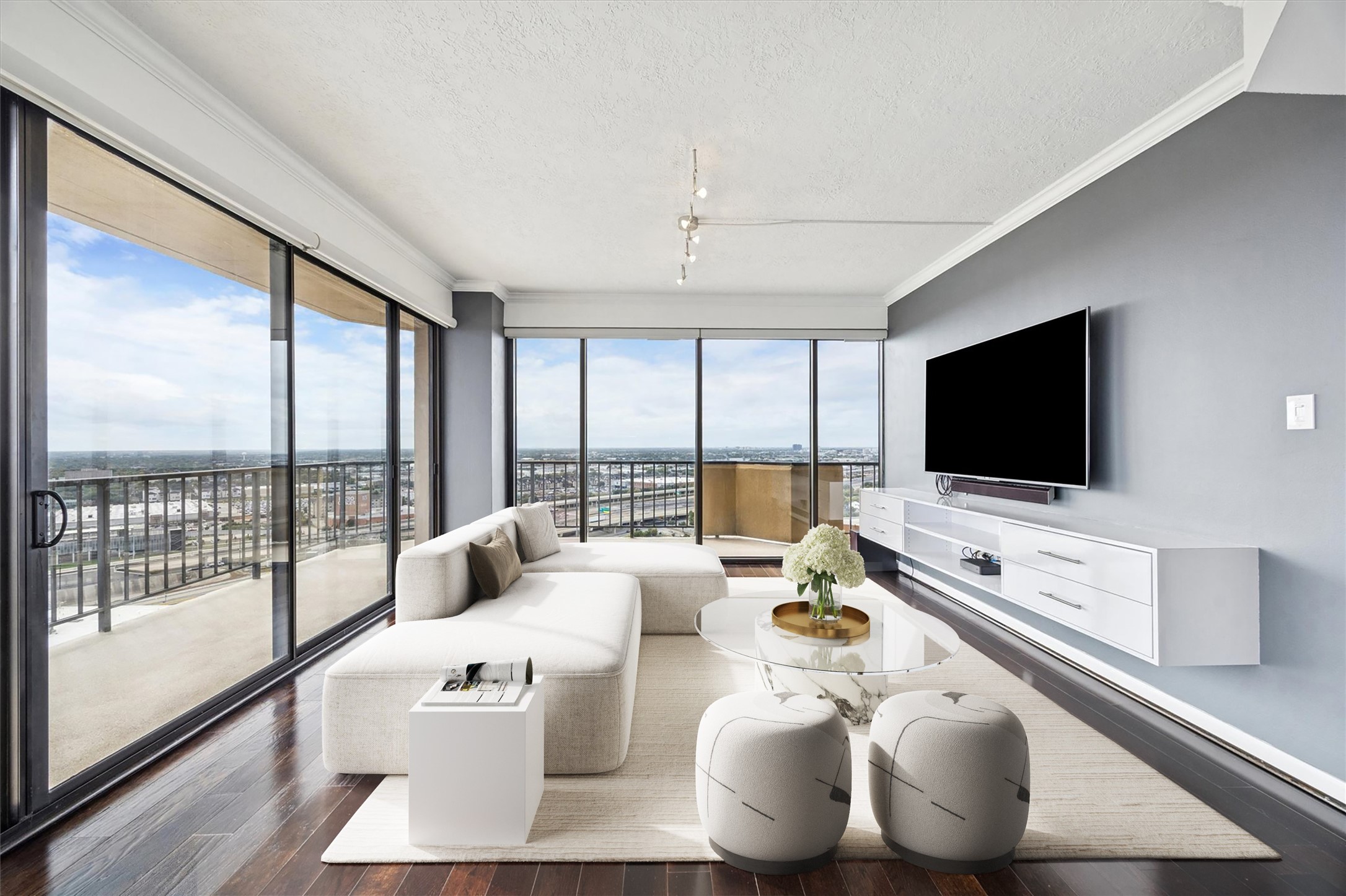 3350 McCue Road, Unit 2201 Houston, TX 77056 - Photo 1 of 27 a living room with furniture and a flat screen tv