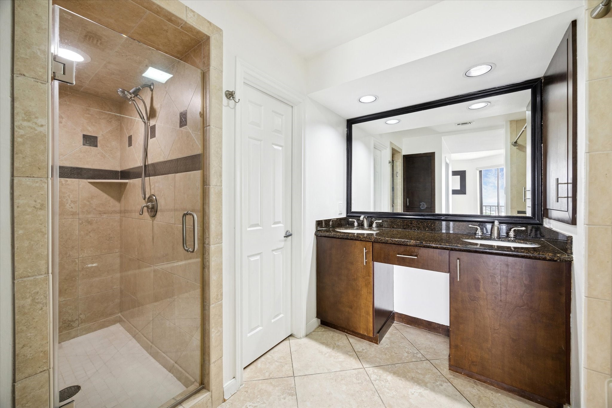 3350 McCue Road, Unit 2201 Houston, TX 77056 - Photo 14 of 27 a bathroom with a bathtub and a shower
