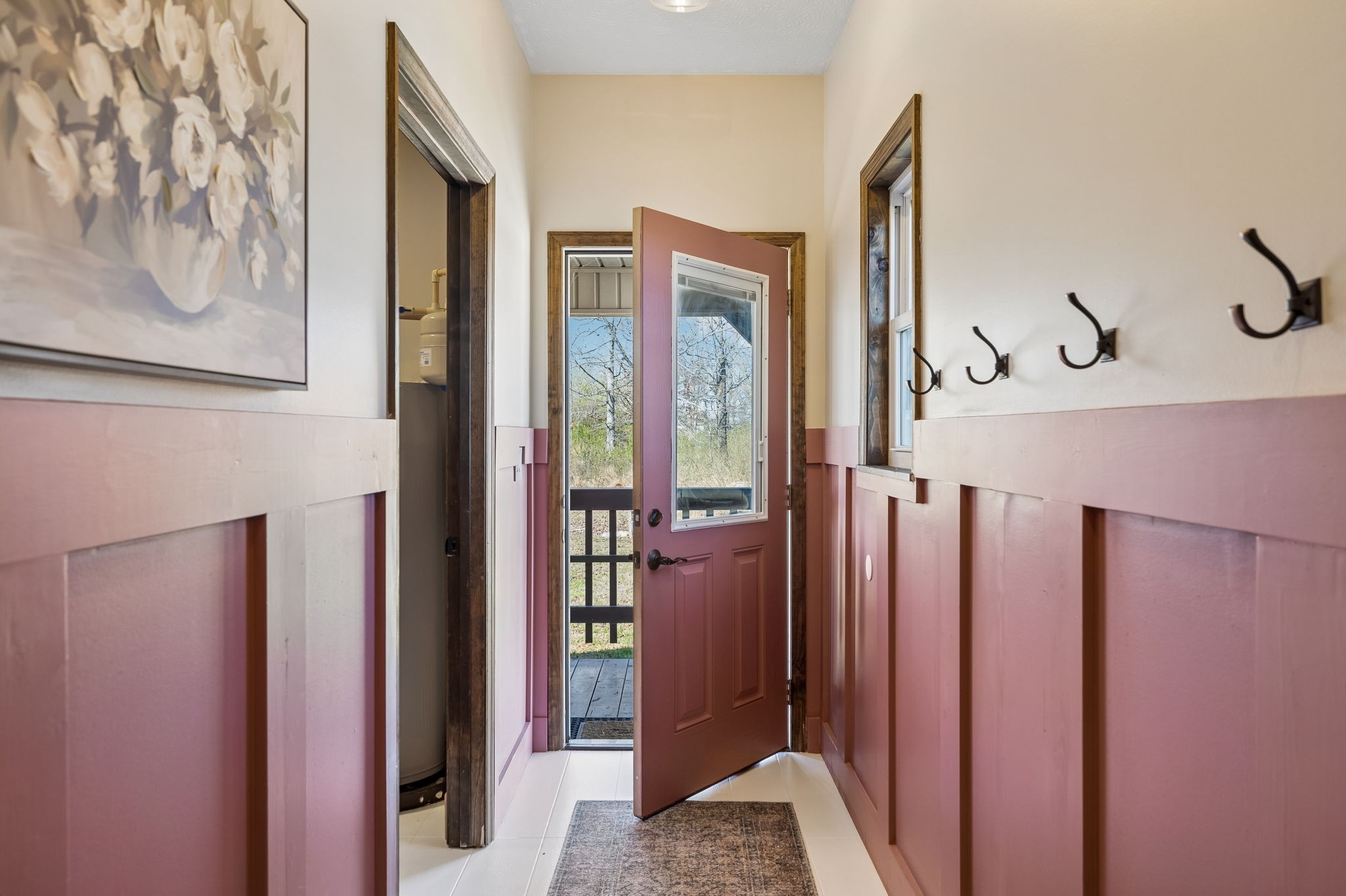 267 Switzerland Road Hohenwald, TN 38462 - Photo 13 of 98 a view of a hallway with a door and stairs