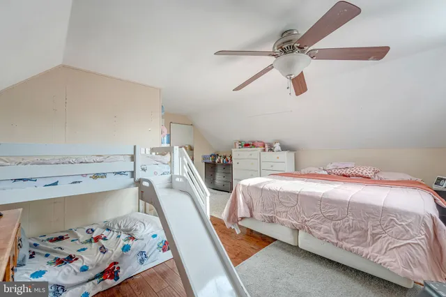 a bedroom with a bed and closet