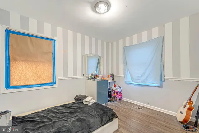 a utility room with sink dryer and washer