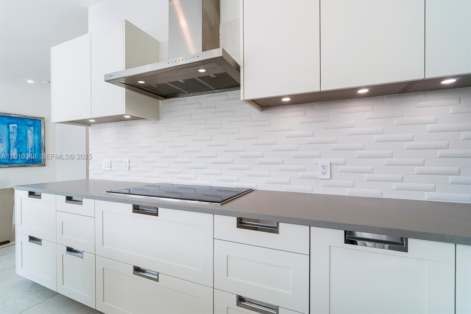 19941 Northeast 36th Place Aventura, FL 33180 - Photo 17 of 39 a view with cabinets a sink and dishwasher