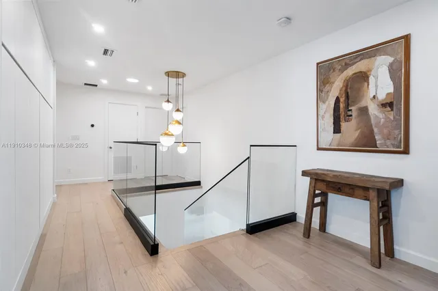 a living room with a couch and a flat screen tv