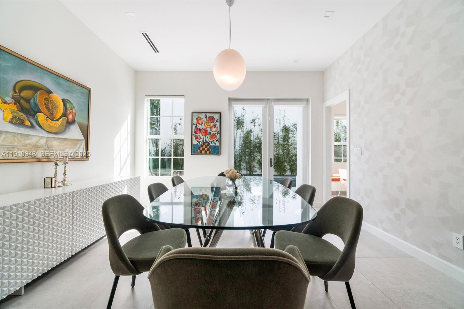 19941 Northeast 36th Place Aventura, FL 33180 - Photo 10 of 39 a view of a dining room with furniture window and outside view