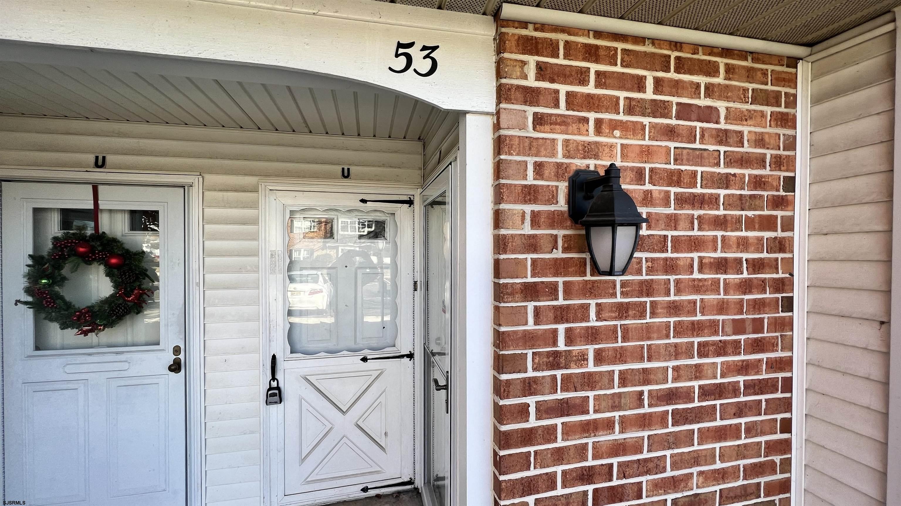 53 U Michael Road, Unit 53 Hammonton, NJ 08037 - Photo 8 of 8 a bathroom with a shower and a mirror