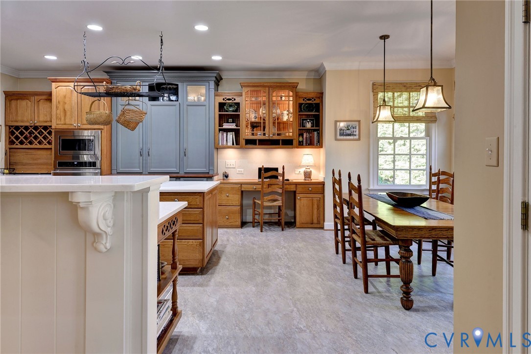 1613 River Ridge Williamsburg, VA 23185 - Photo 16 of 83 Kitchen with glass insert cabinets, light countert