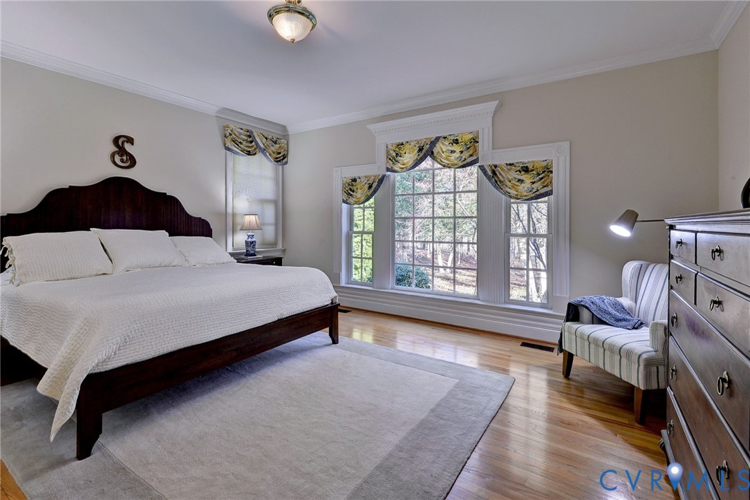 1613 River Ridge Williamsburg, VA 23185 - Photo 28 of 83 Bedroom with crown molding and light wood-type flo