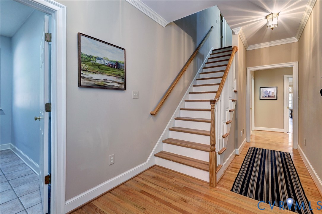 1613 River Ridge Williamsburg, VA 23185 - Photo 34 of 83 Stairs featuring wood finished floors and ornament