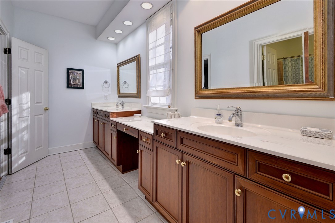 1613 River Ridge Williamsburg, VA 23185 - Photo 38 of 83 Full bathroom with two vanities, light tile patter