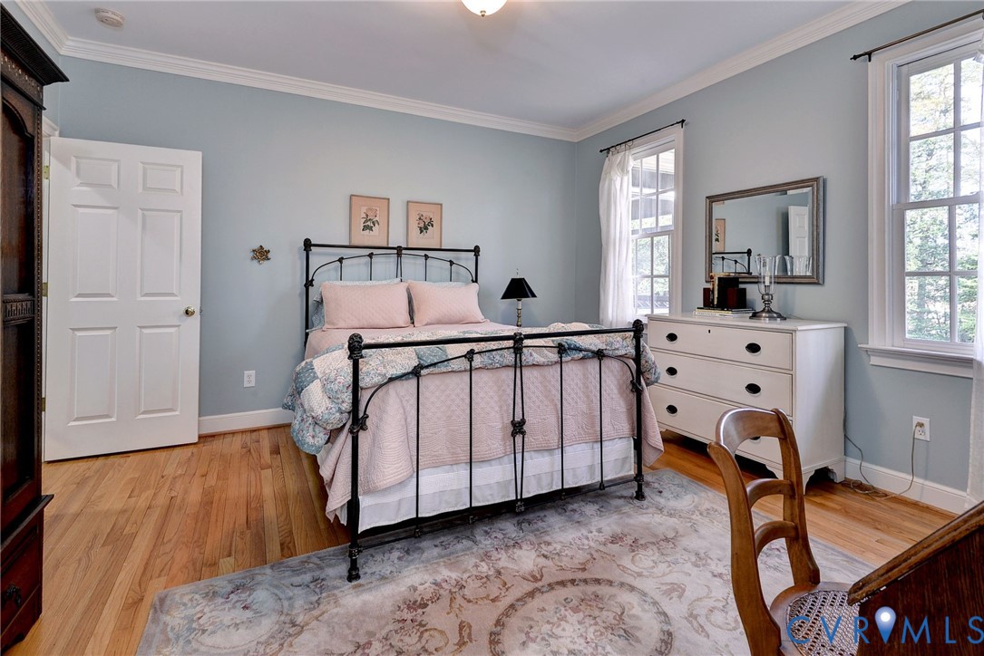 1613 River Ridge Williamsburg, VA 23185 - Photo 39 of 83 Bedroom featuring crown molding and light wood-sty