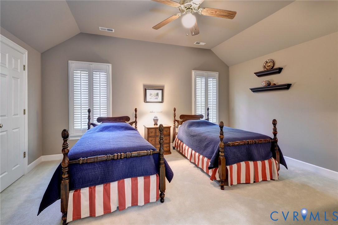 1613 River Ridge Williamsburg, VA 23185 - Photo 43 of 83 Carpeted bedroom featuring baseboards and ceiling