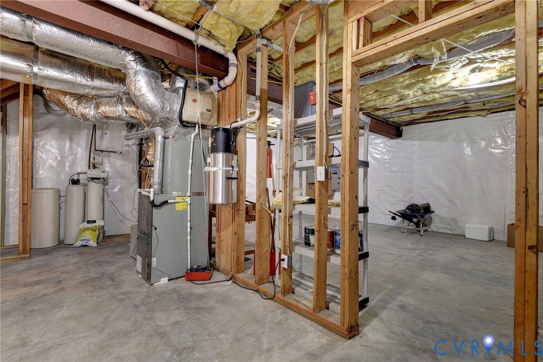 1613 River Ridge Williamsburg, VA 23185 - Photo 54 of 83 Unfinished basement featuring a water softener and