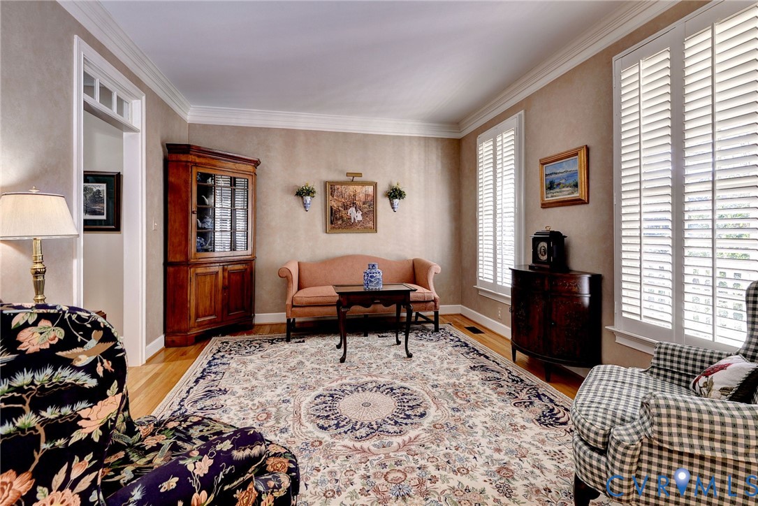 1613 River Ridge Williamsburg, VA 23185 - Photo 8 of 83 Living room with light wood-style flooring and orn