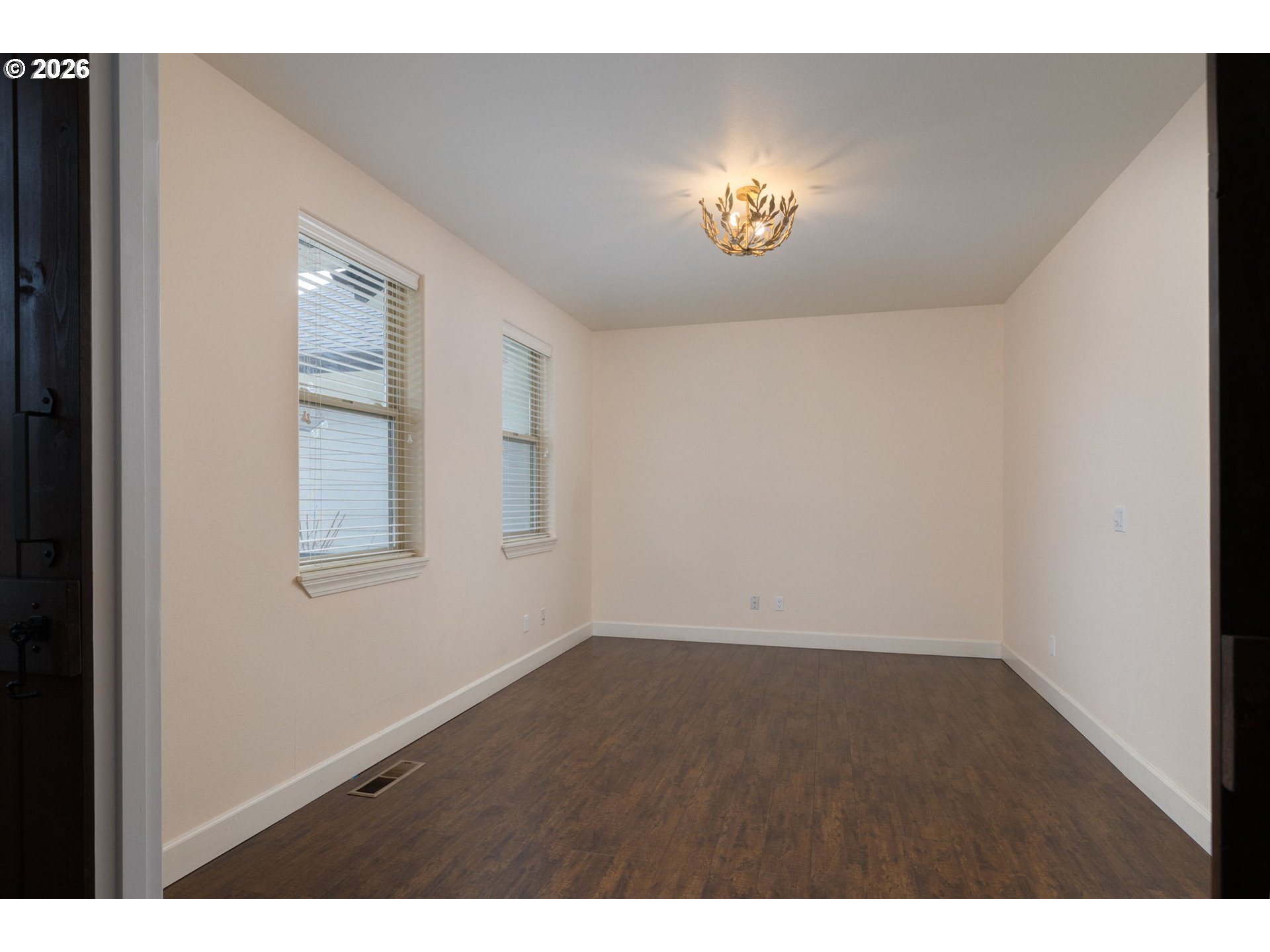 20246 Gaines Court Bend, OR 97702 - Photo 14 of 37 a view of an empty room with a window