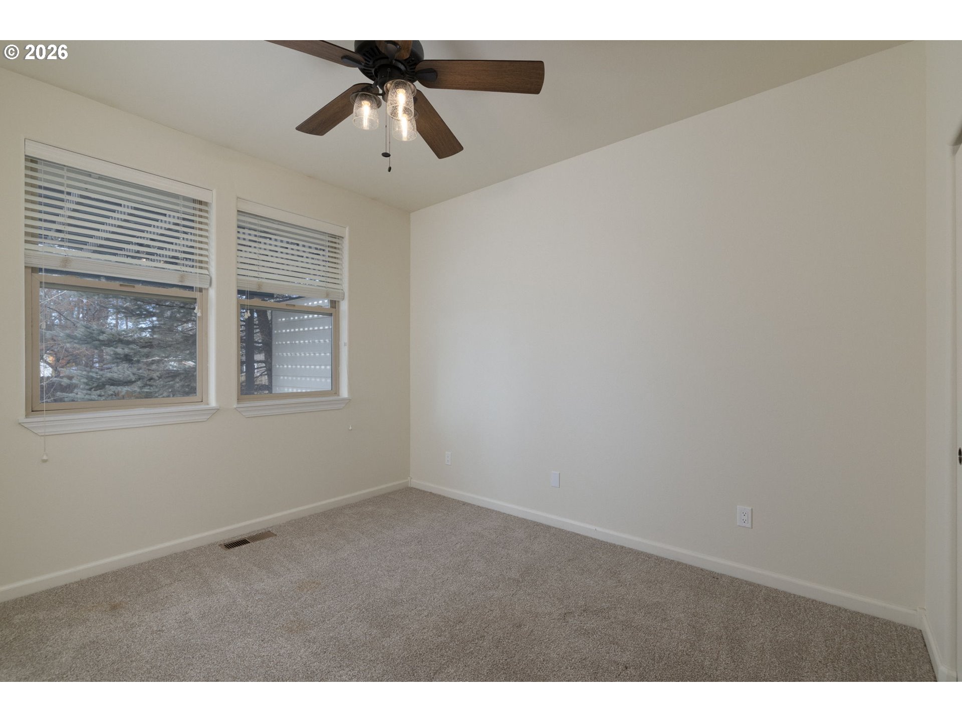 20246 Gaines Court Bend, OR 97702 - Photo 19 of 37 a view of an empty room with a window