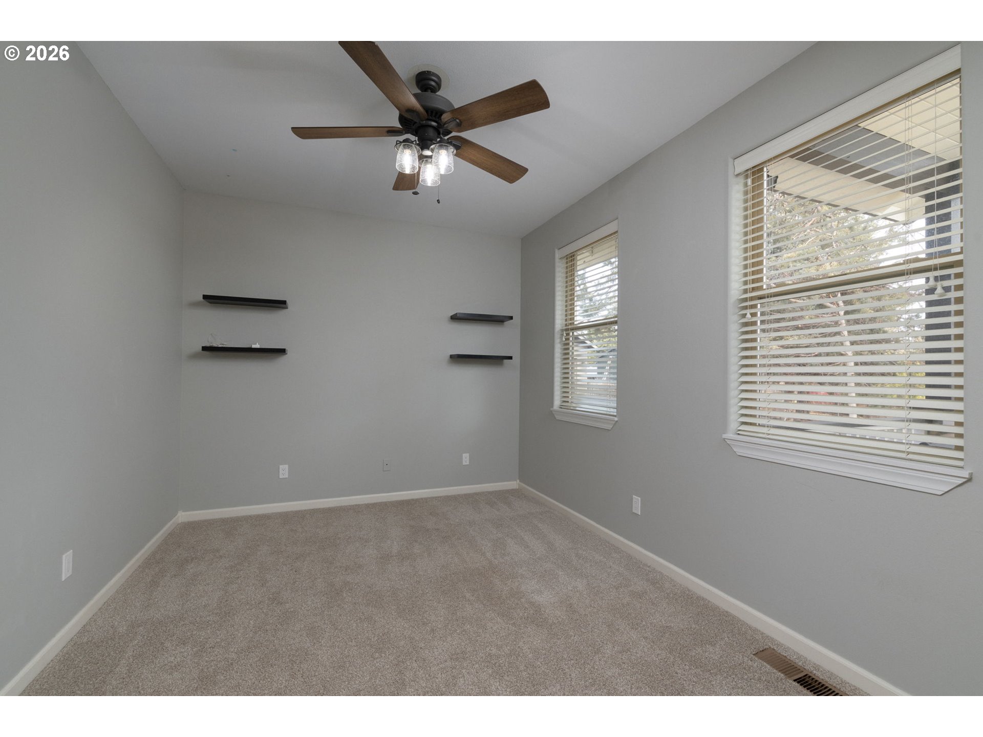 20246 Gaines Court Bend, OR 97702 - Photo 20 of 37 a view of an empty room with a window
