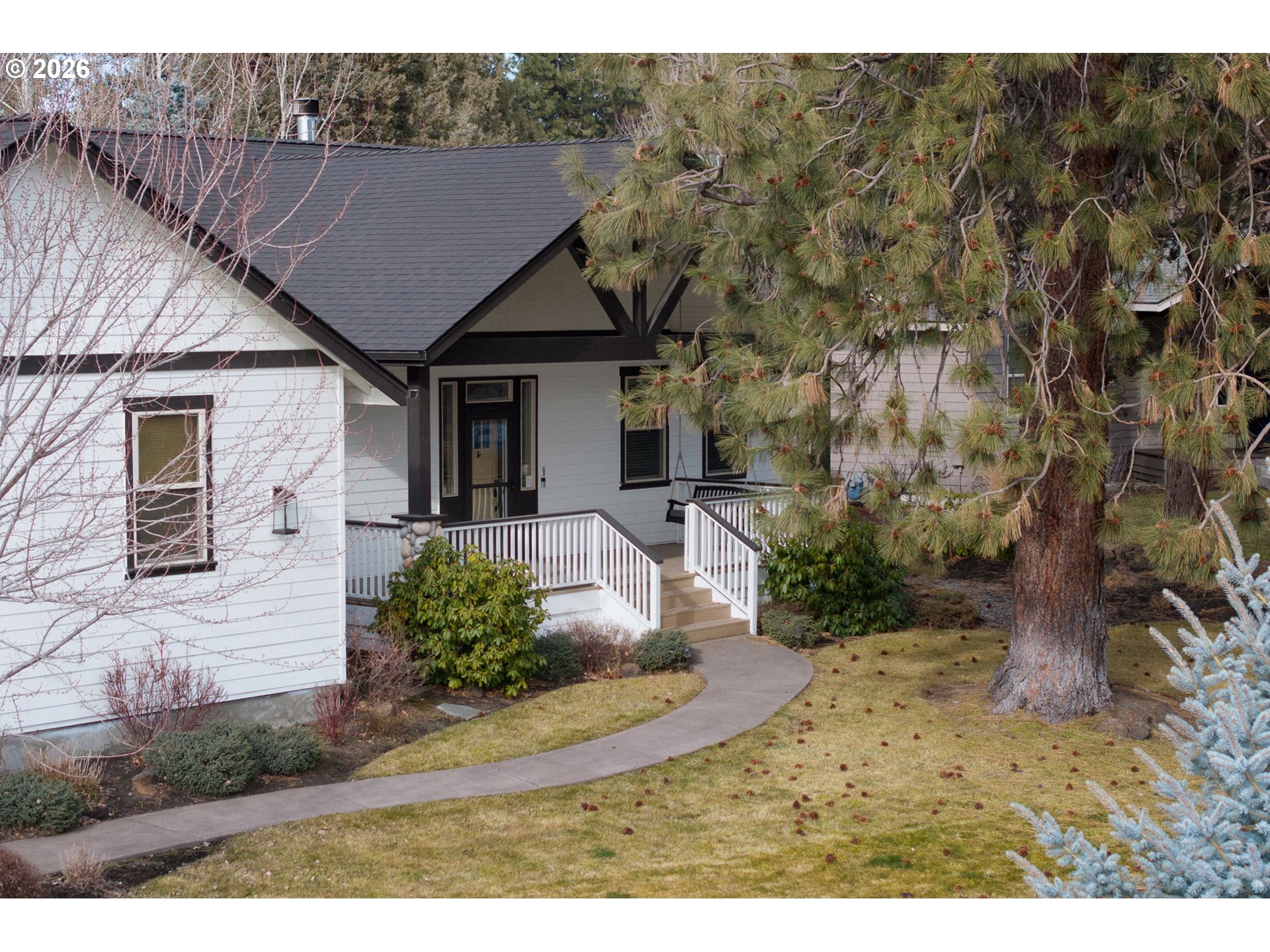 20246 Gaines Court Bend, OR 97702 - Photo 29 of 37 a view of a house with a yard