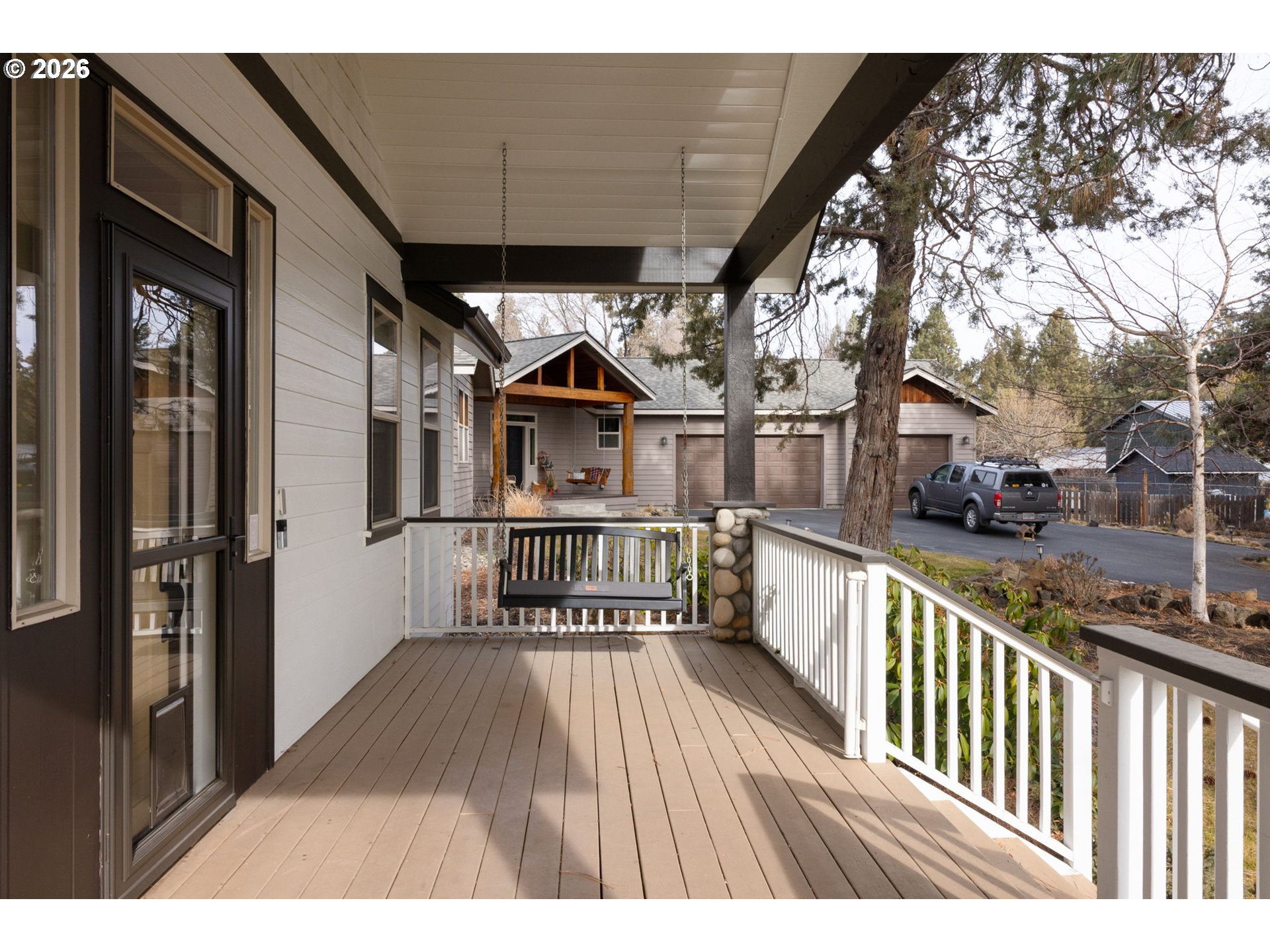 20246 Gaines Court Bend, OR 97702 - Photo 3 of 37 a view of a house with wooden deck