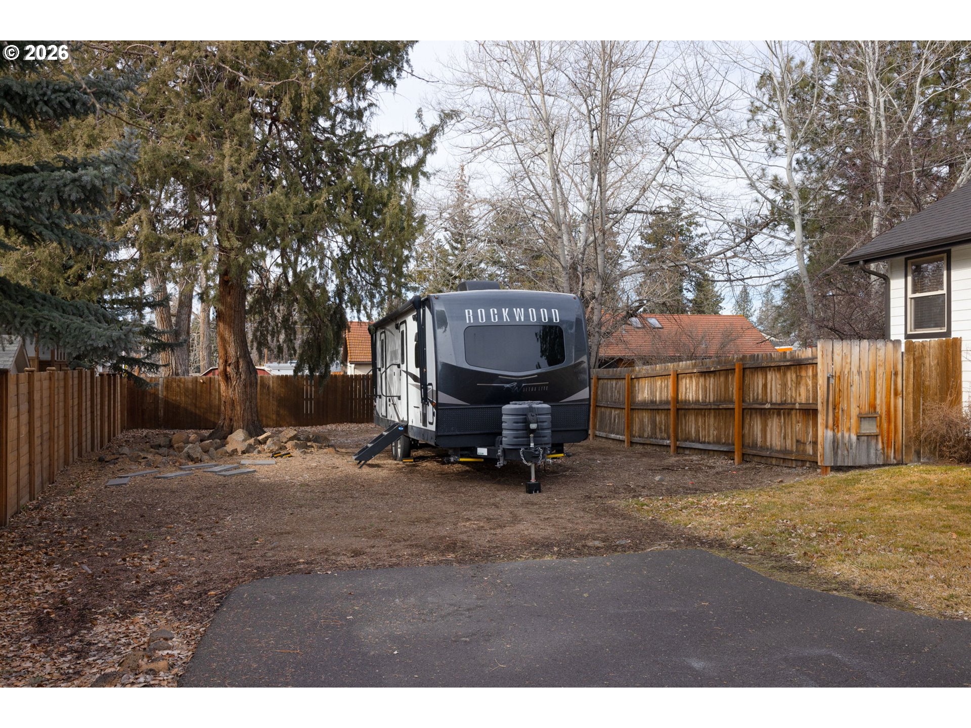 20246 Gaines Court Bend, OR 97702 - Photo 36 of 37 a view of a barn in the middle of a yard