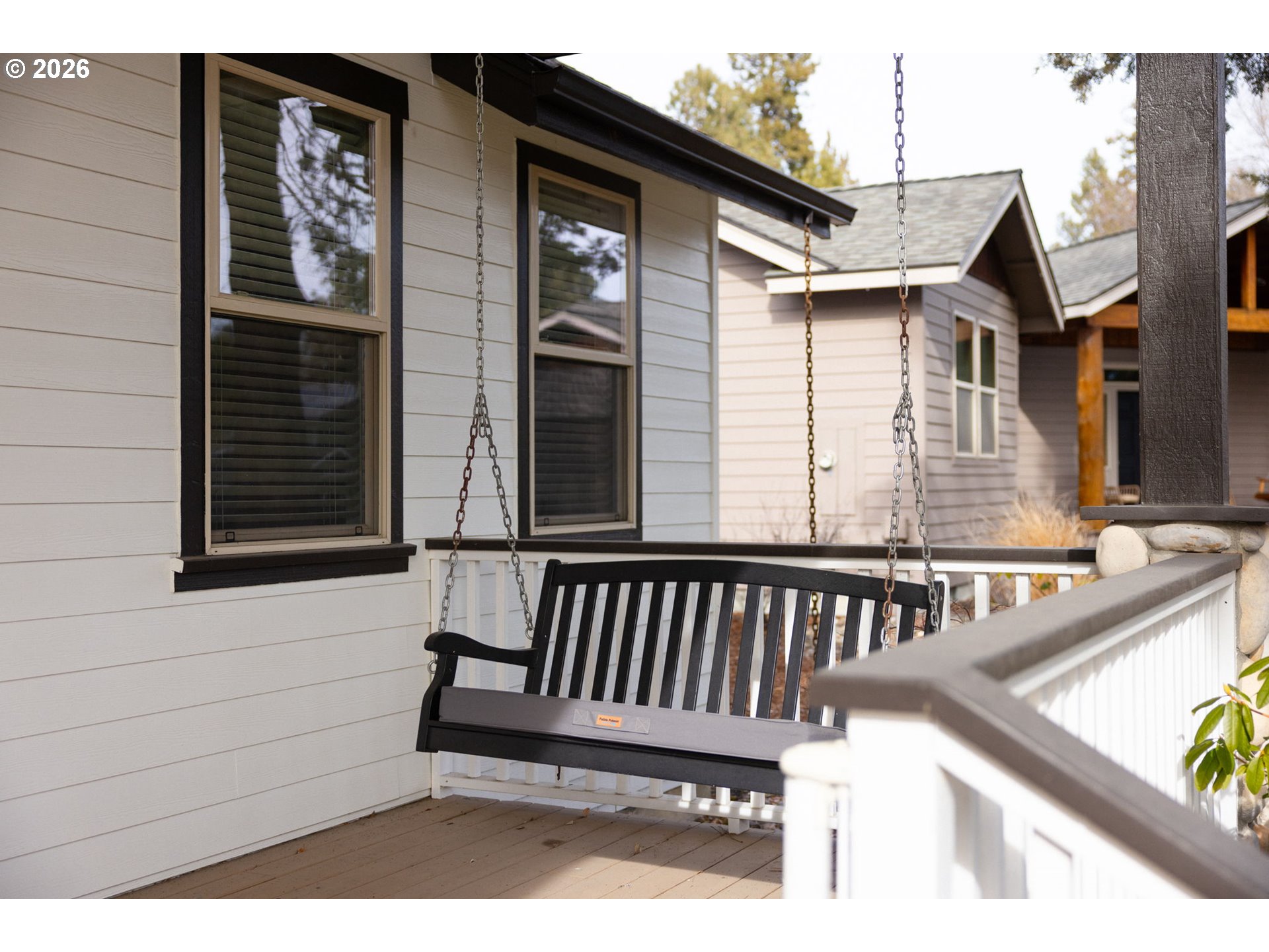 20246 Gaines Court Bend, OR 97702 - Photo 4 of 37 a view of a chair and table in the balcony