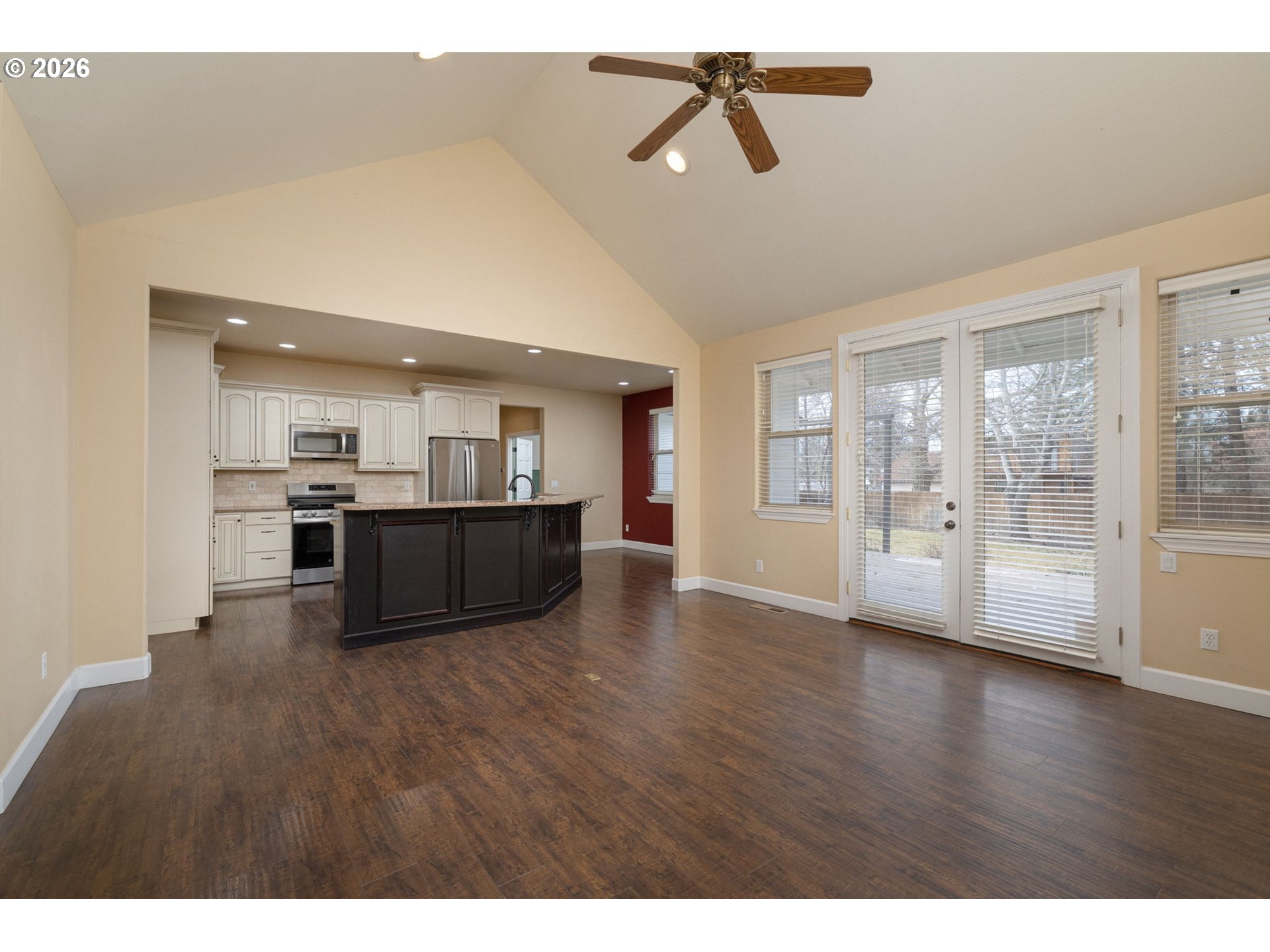 20246 Gaines Court Bend, OR 97702 - Photo 10 of 37 a view of kitchen with furniture and wooden floor